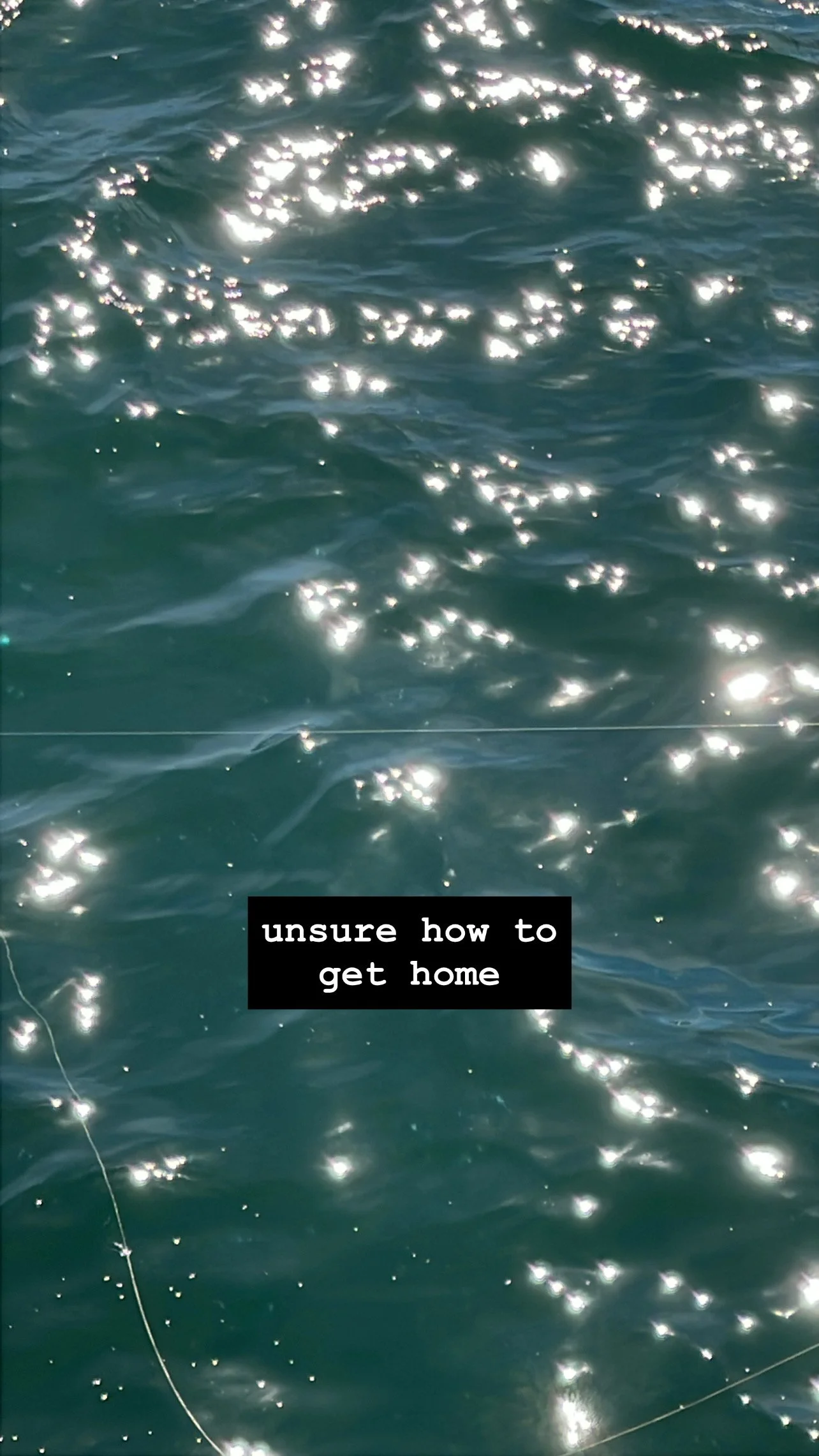 Close-up photo of sunlight sparkling on water. Caption: unsure how to get home.