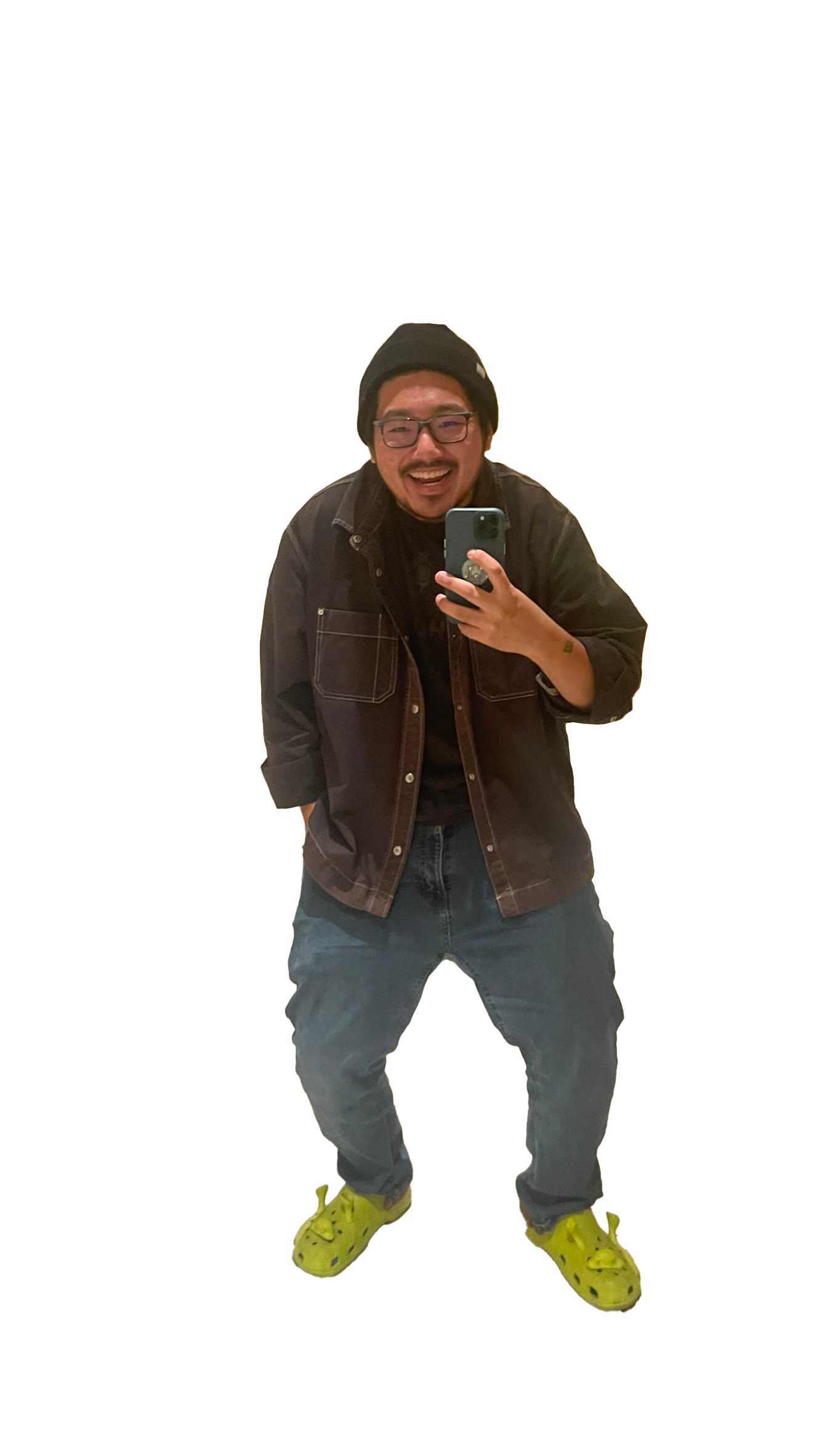 Andrew Morro, cutout selfie photo, wearing glasses, a black beanie, a dark jacket, jeans, and Shrek Crocs.